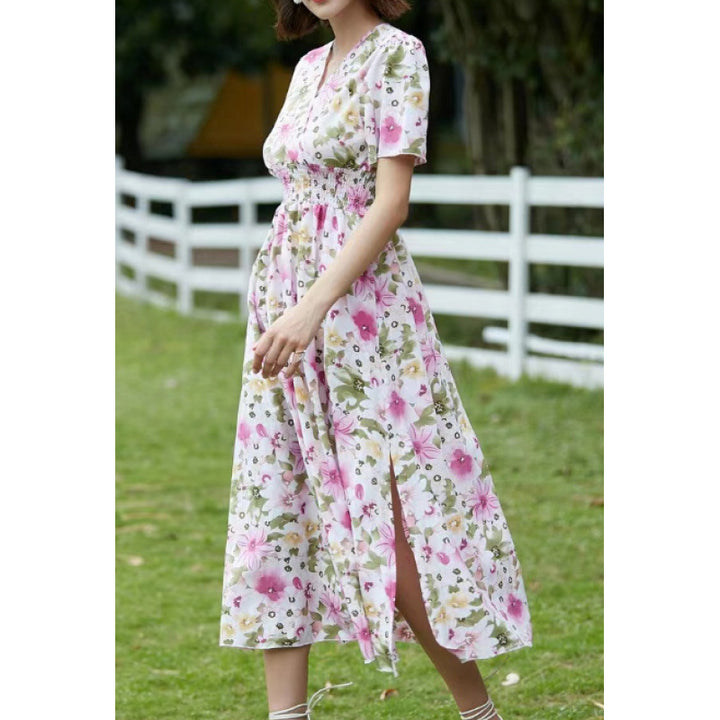 Dame Maxiklänning med flytande skärning och blommig design Mirla-Eva Jonsson