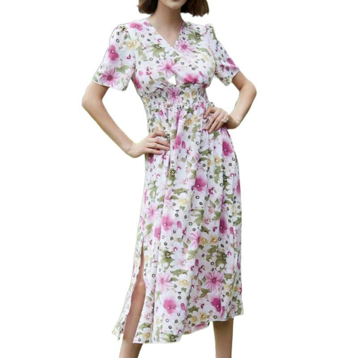 Dame Maxiklänning med flytande skärning och blommig design Mirla-Eva Jonsson