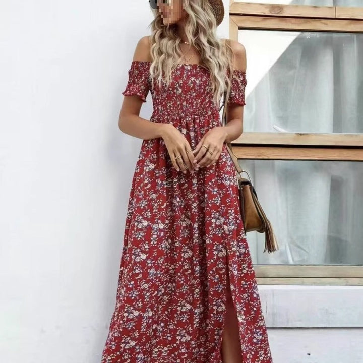 Dame Maxiklänning med off-shoulder silhuett och blommig design Mirla-Eva Jonsson