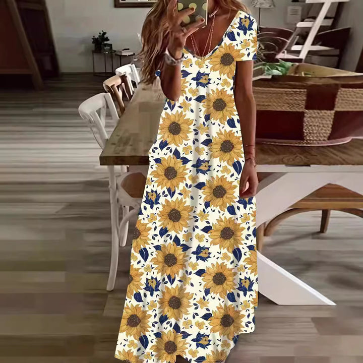 Dame Maxiklänning med stiligt blommor- och djurmönster Eva Jonsson-Eva Jonsson