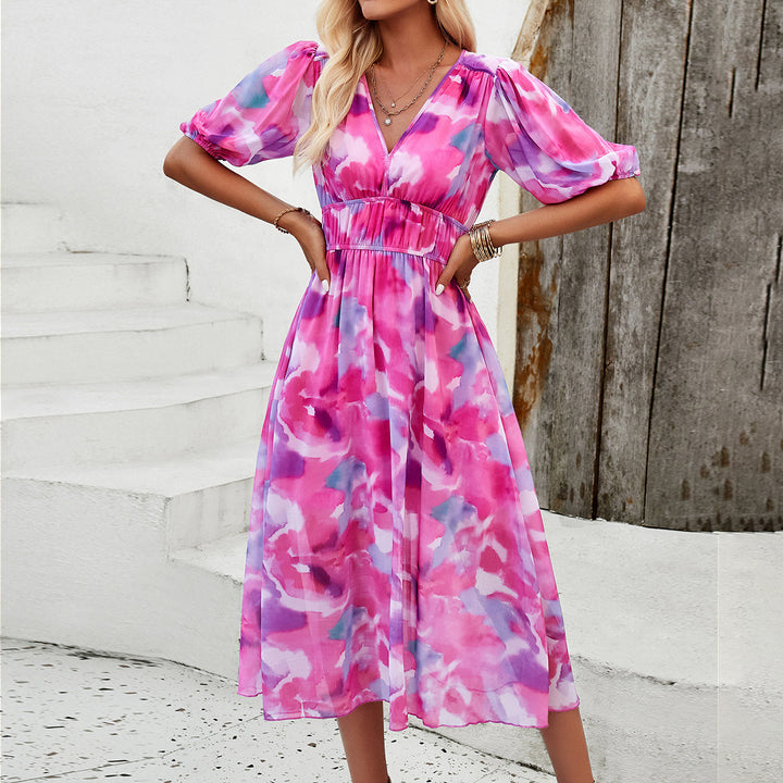 Dame Midi Dress med eleganta puffärmar och romantisk blommönster Mirla-Eva Jonsson