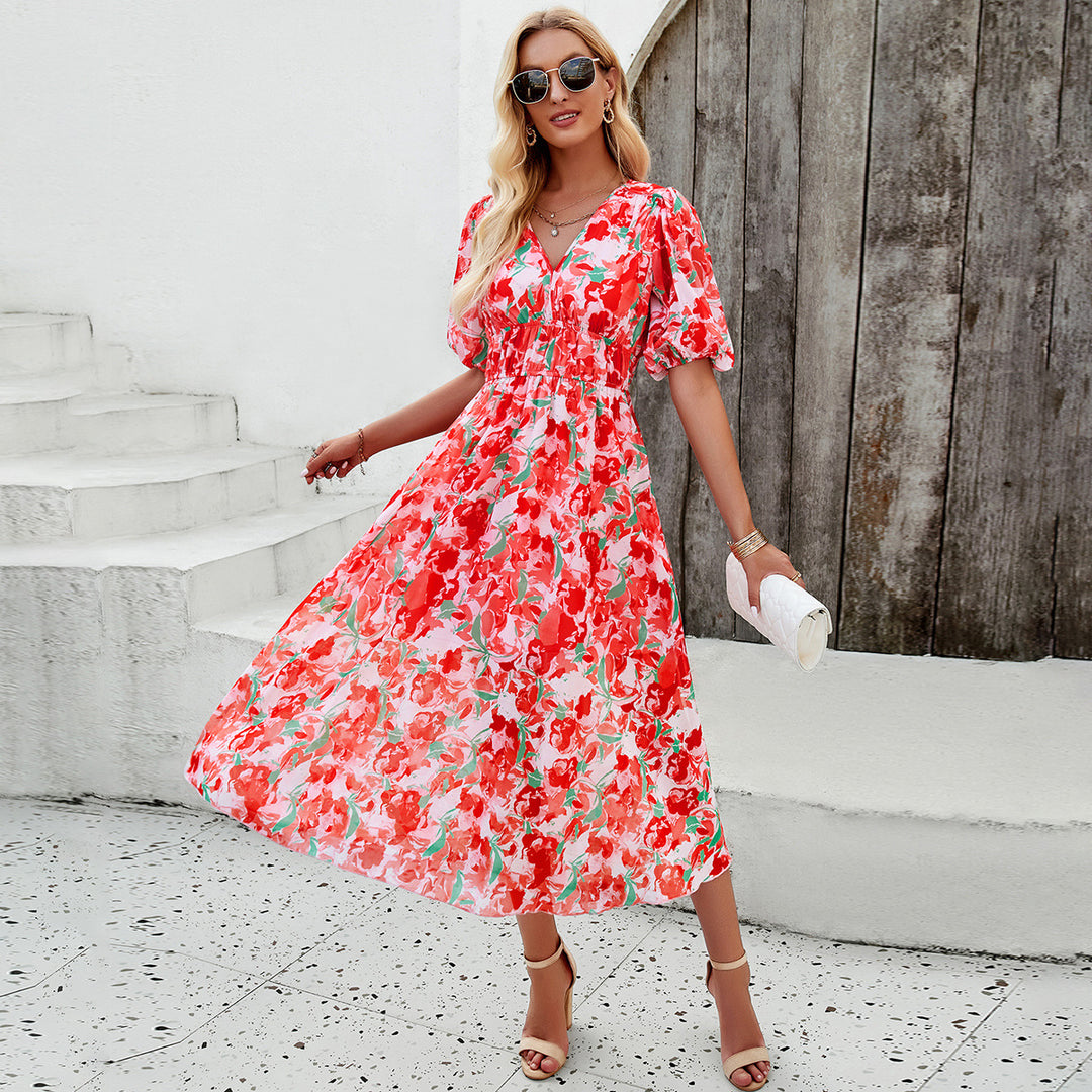 Dame Midi Dress med eleganta puffärmar och romantisk blommönster Mirla-Eva Jonsson