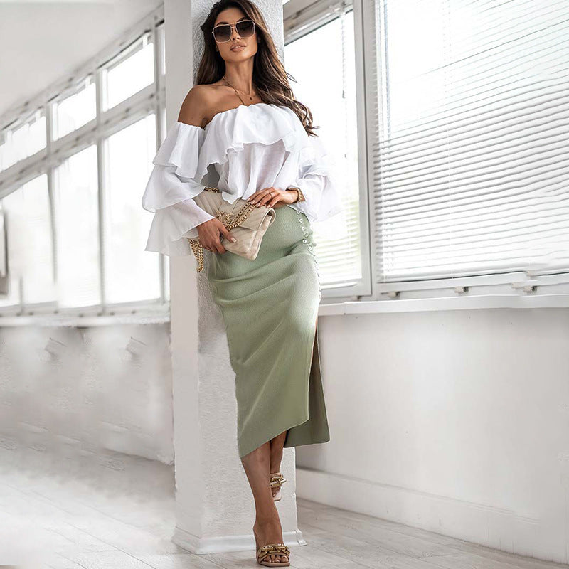 Dame Midi-kjol med eleganta knapppdetaljer och sidovy slit Mirla-Eva Jonsson