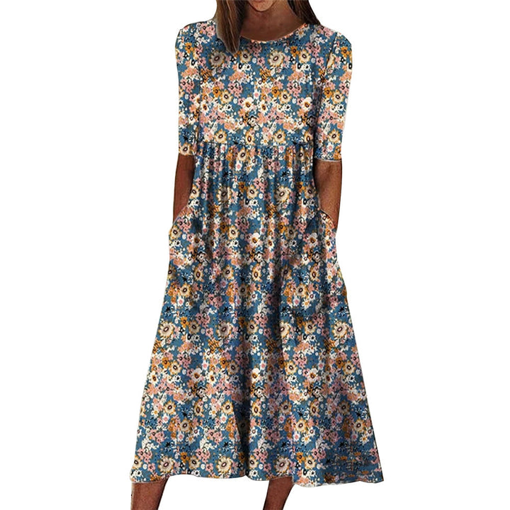 Dame Midi-klänning med blommönster och praktiska fickor Mirla-Eva Jonsson