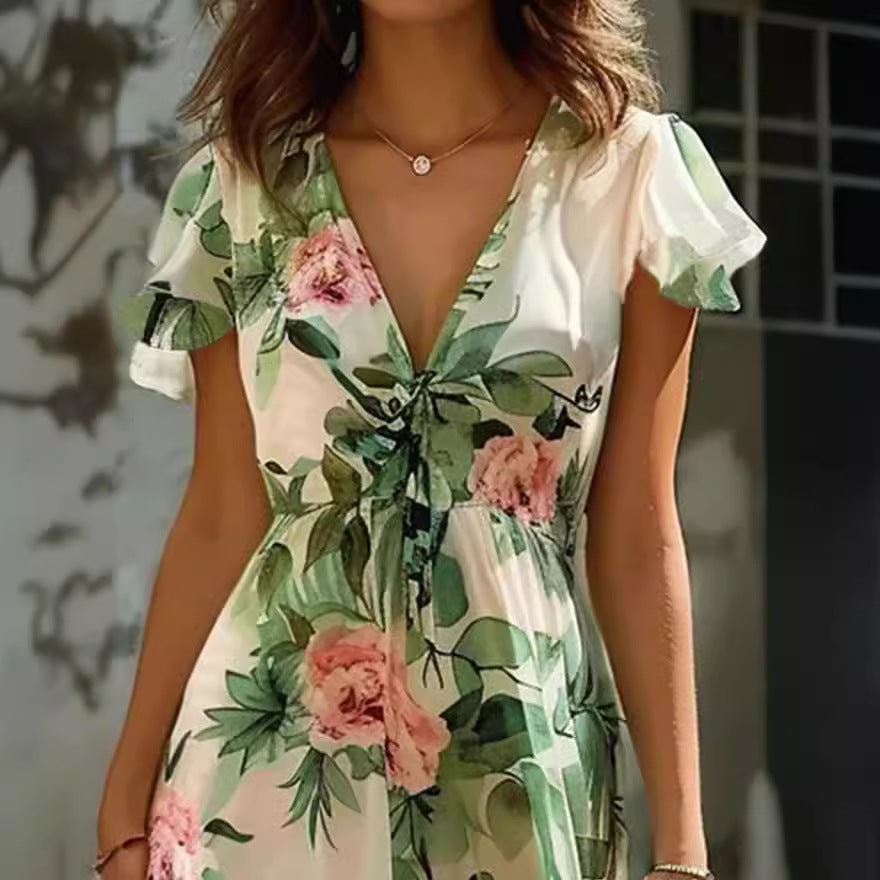 Dame Midikläd med blommig design Mirla-Eva Jonsson
