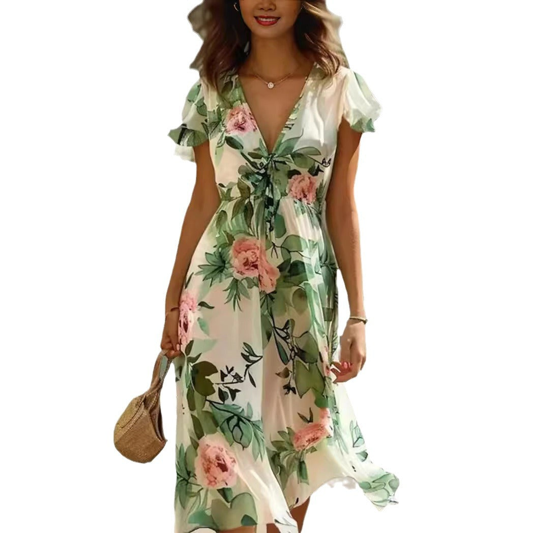 Dame Midikläd med blommig design Mirla-Eva Jonsson