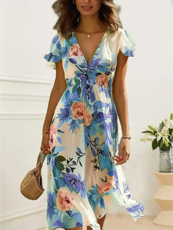 Dame Midikläd med blommig design Mirla-Eva Jonsson