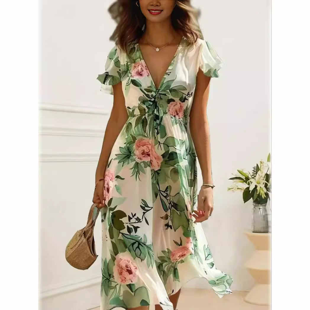 Dame Midikläd med blommig design Mirla-Eva Jonsson
