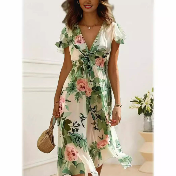 Dame Midikläd med blommig design Mirla-Eva Jonsson