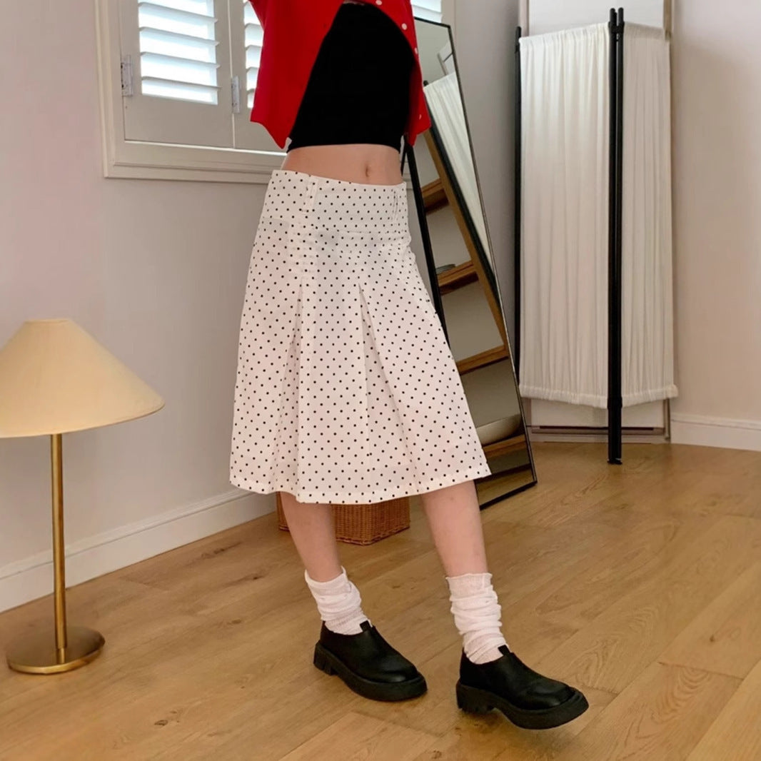 Dame Midirock med lekfullt prickmönster och elegant A-linje Mirla-Eva Jonsson
