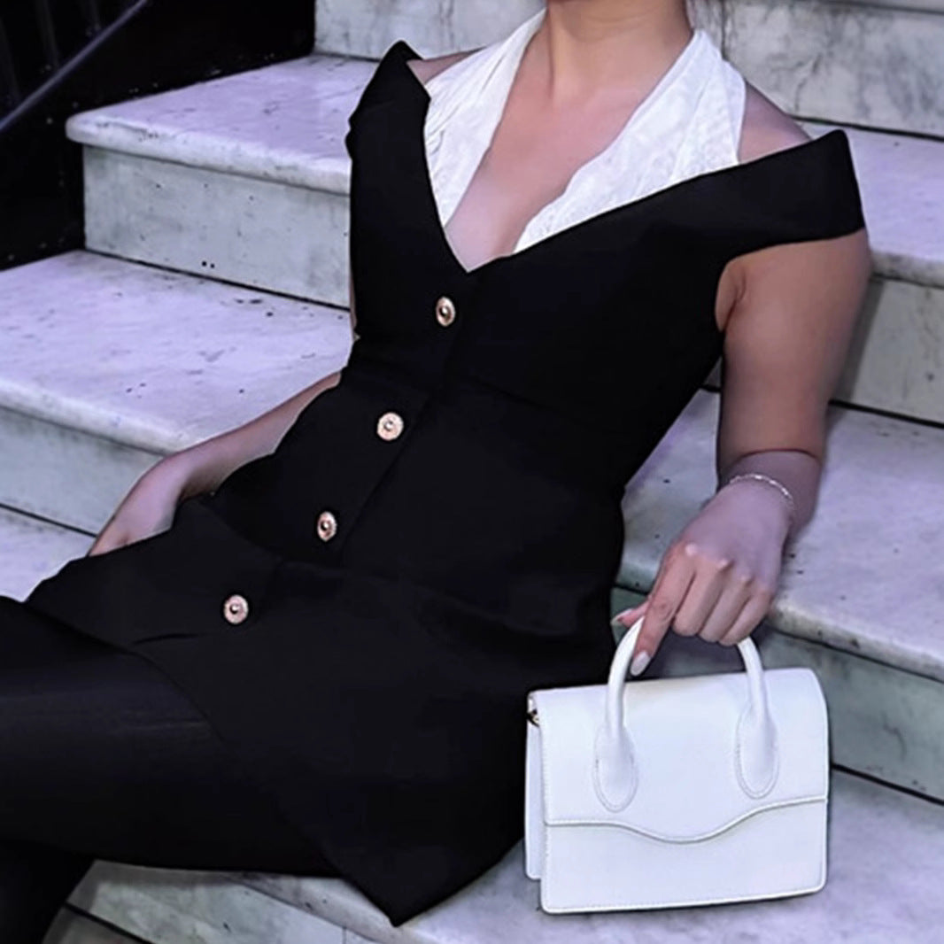 Dame Miniklänning med snyggt off-shoulder utförande och elegant knappstängning Mirla-Eva Jonsson