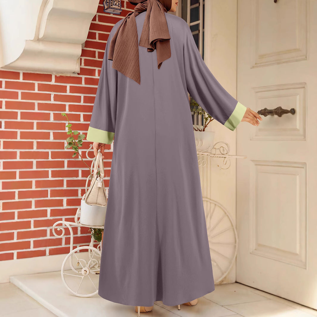 Dame Mode-Abaya med vida ärmar och minimalistiska färgaccenter Mirla-Eva Jonsson