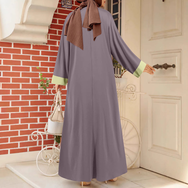 Dame Mode-Abaya med vida ärmar och minimalistiska färgaccenter Mirla-Eva Jonsson