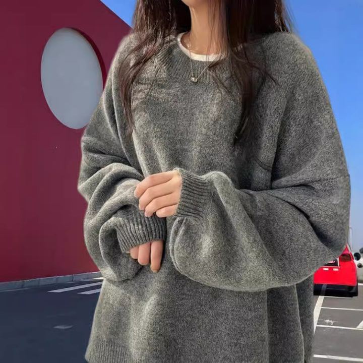 Dame Oversized Stickad tröja med eleganta puffärmar och modern design Mirla-Eva Jonsson