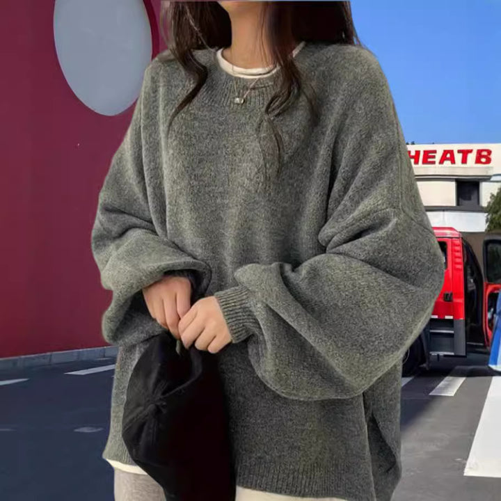 Dame Oversized Stickad tröja med eleganta puffärmar och modern design Mirla-Eva Jonsson