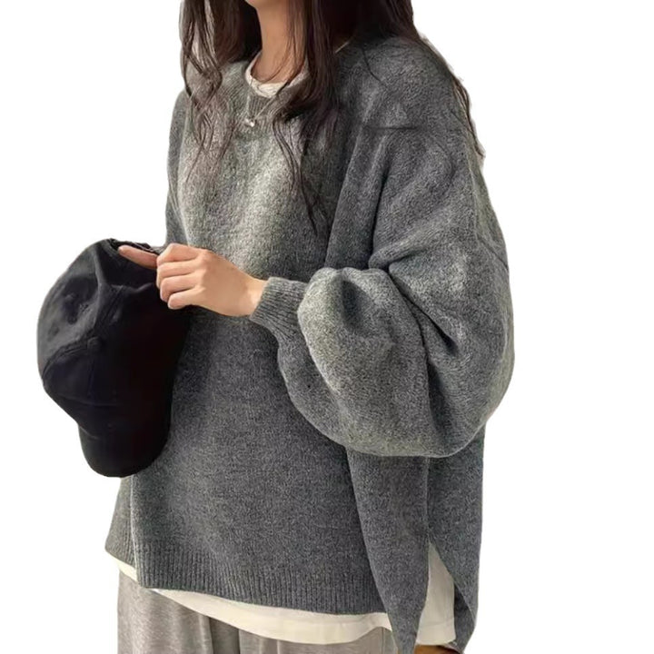Dame Oversized Stickad tröja med eleganta puffärmar och modern design Mirla-Eva Jonsson