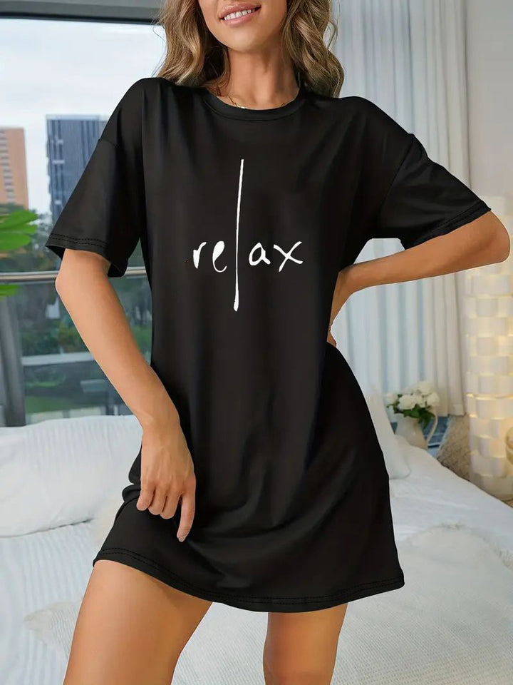 Dame Oversized T-shirt med inspirerande text och iögonfallande grafisk design Mirla-Eva Jonsson