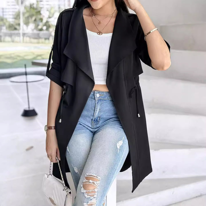 Dame Oversized Trenchcoat med möjligt midjeband och avslappnad passform Mirla-Eva Jonsson