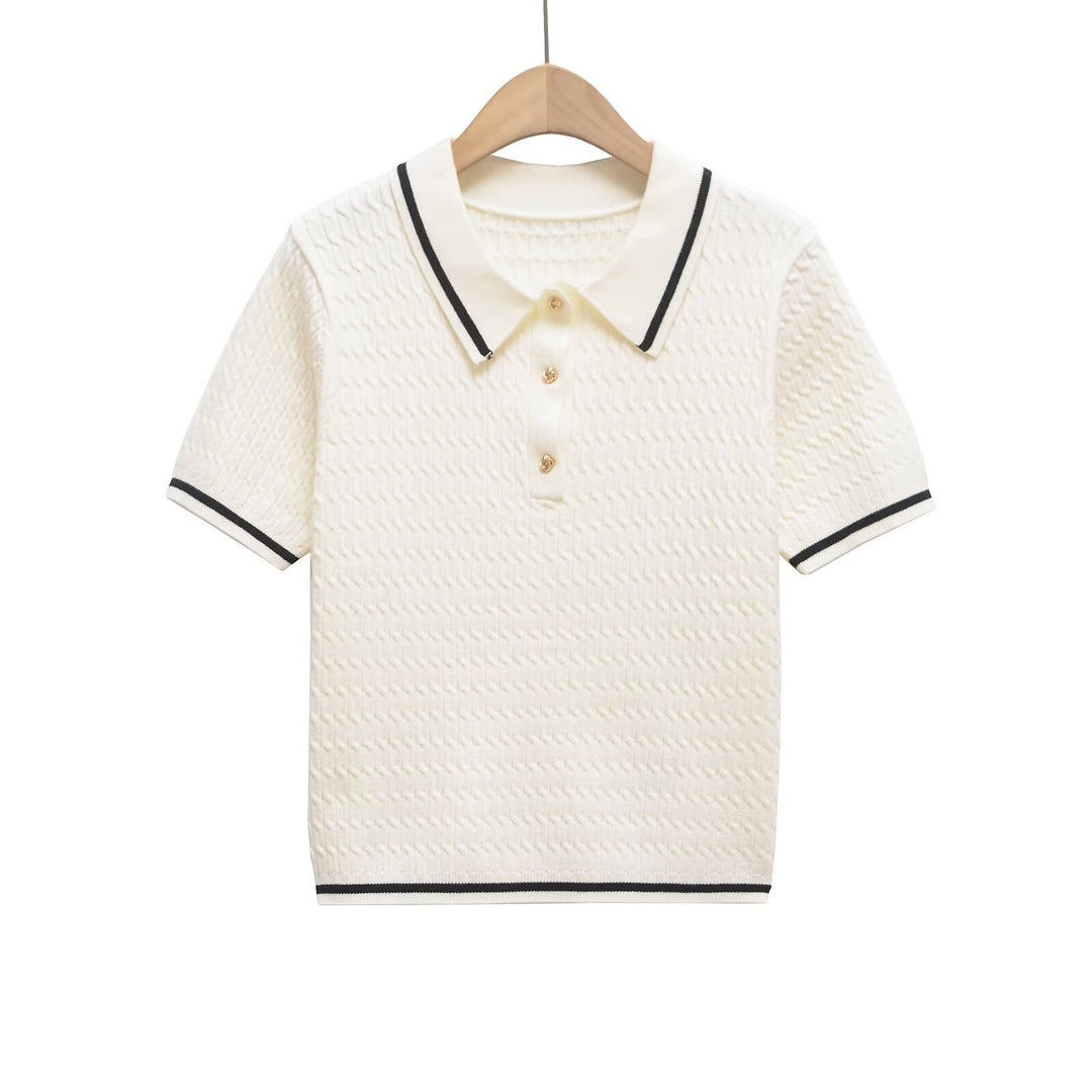 Dame Poloshirt med strukturerat material och eleganta knapppdetaljer Mirla-Eva Jonsson