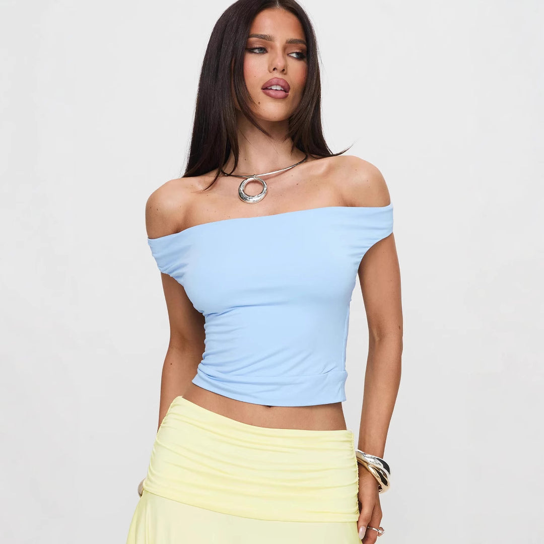 Dame Racerback Top med djup V-urringning och elegant halterdesign Mirla-Eva Jonsson