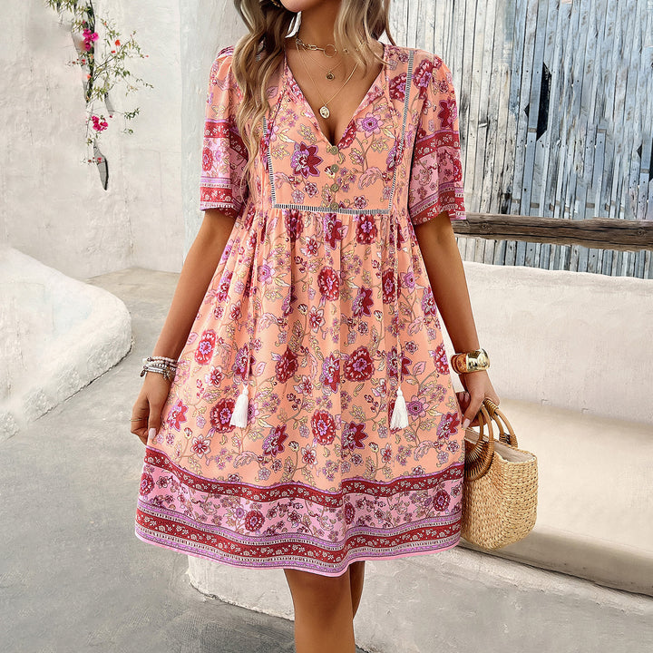 Dame Retro-Chic dress with floral pattern and flowing skirt Mirla-Eva Jonsson