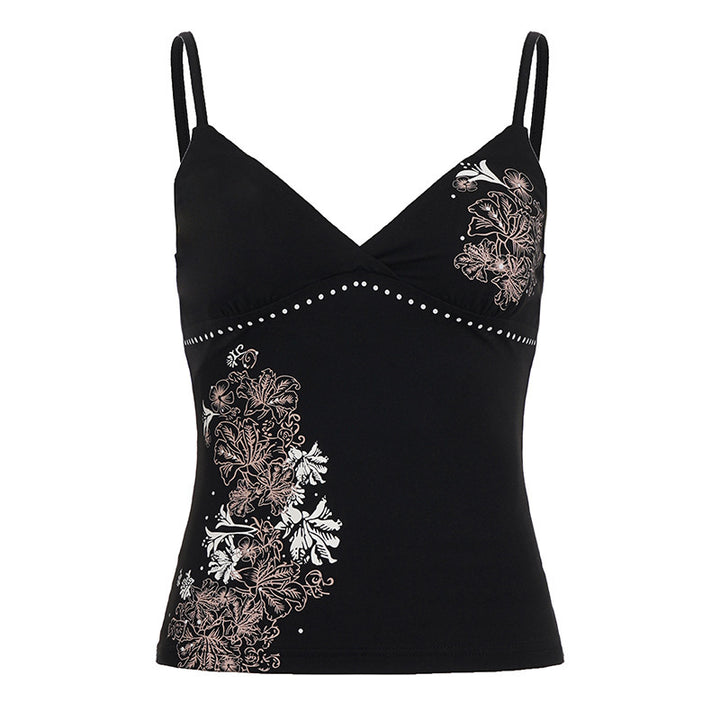 Dame Spaghetti-ärmlig topp med blommigt tryck och eleganta detaljer Mirla-Eva Jonsson