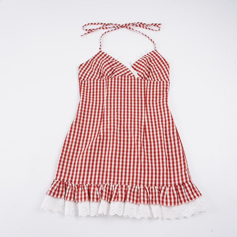 Dame Spaghetti straps dress with playful gingham pattern and ruffle hem Mirla-Eva Jonsson
