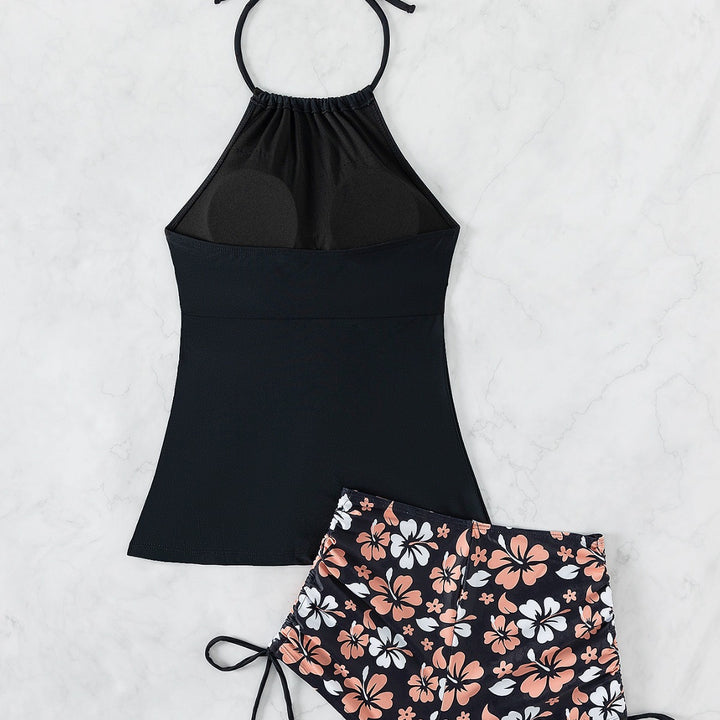 Dame Sporttop med justerbar nackrem och blommönster Shorts Mirla-Eva Jonsson