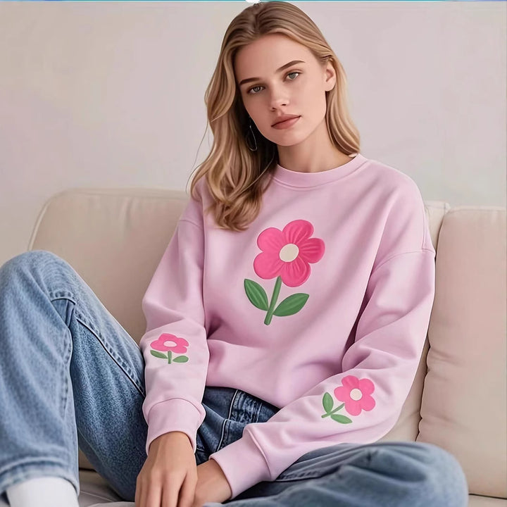 Dame Sweatshirt med färgglad blommotiv Mirla-Eva Jonsson