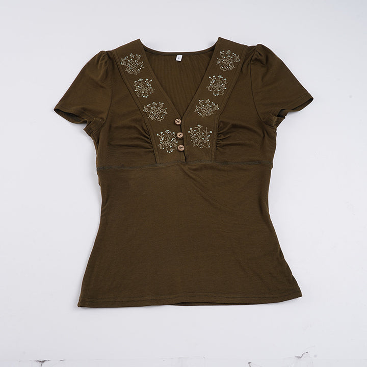 Dame T-shirt med blommönster broderi och knappdetaljer Mirla-Eva Jonsson
