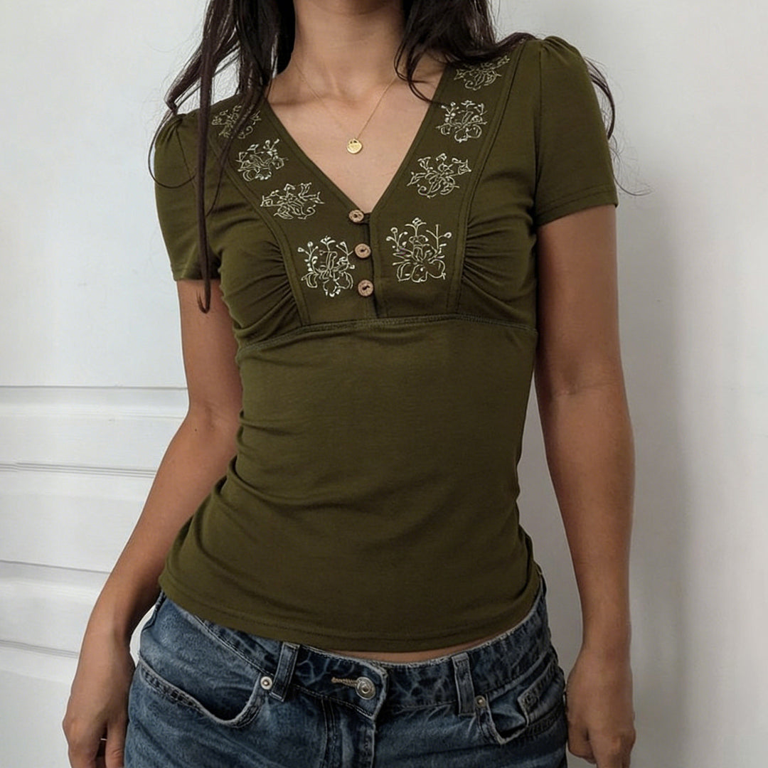 Dame T-shirt med blommönster och knappslå Mirla-Eva Jonsson