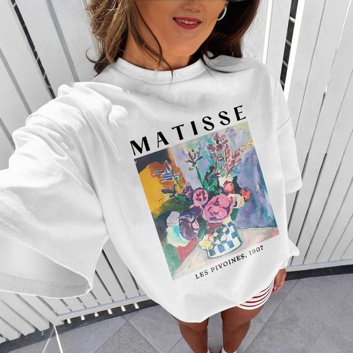 Dame T-shirt med konstnärlig grafisk tryck och avslappnad passform Mirla-Eva Jonsson