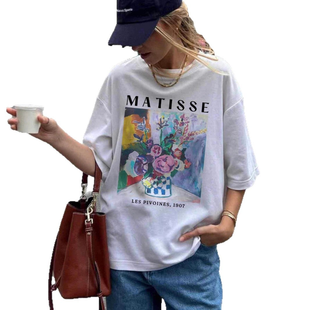 Dame T-shirt med konstnärlig grafisk tryck och avslappnad passform Mirla-Eva Jonsson