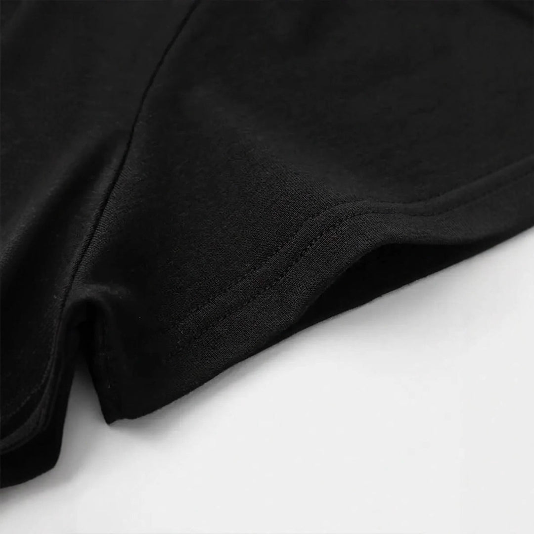 Dame T-shirt med kreativt tryck och eleganta pärlaccenter Mirla-Eva Jonsson