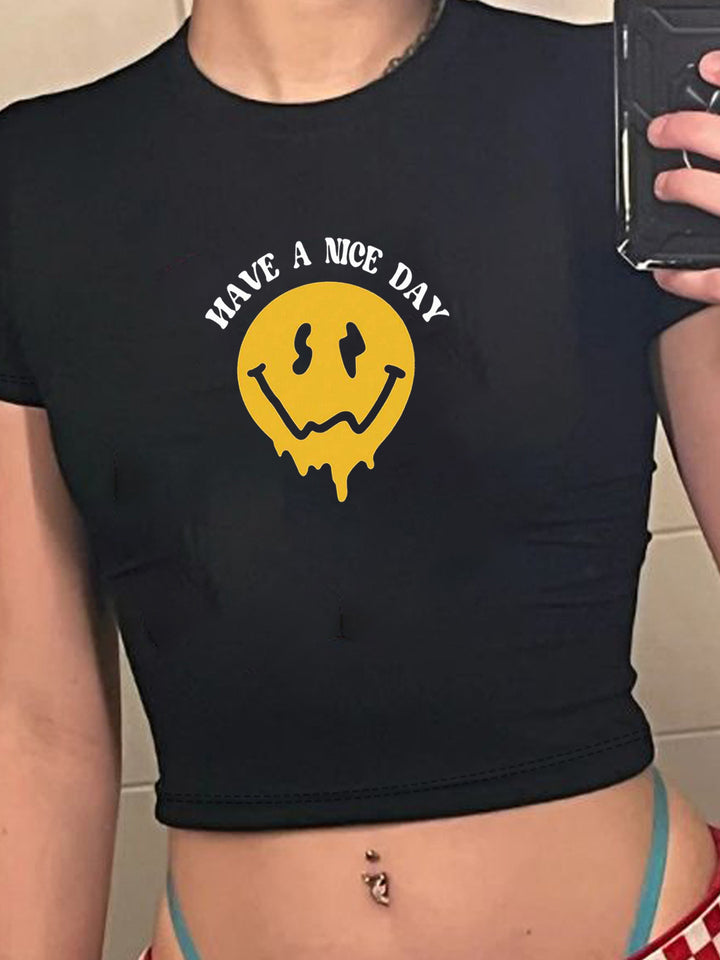 Dame T-shirt med lekfullt kattmotiv och ömma vingar Mirla-Eva Jonsson