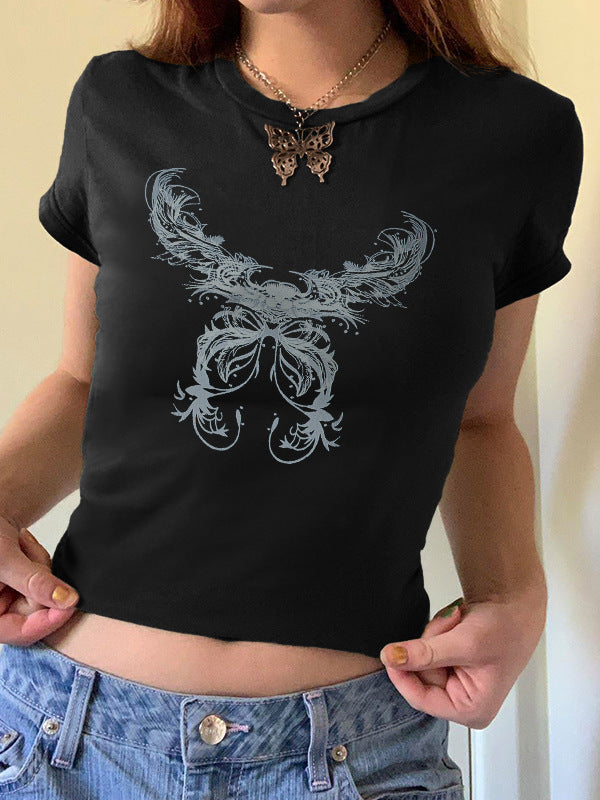 Dame T-shirt med lekfullt kattmotiv och ömma vingar Mirla-Eva Jonsson