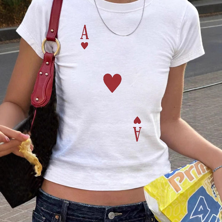Dame T-shirt med lekfullt kattmotiv och ömma vingar Mirla-Eva Jonsson