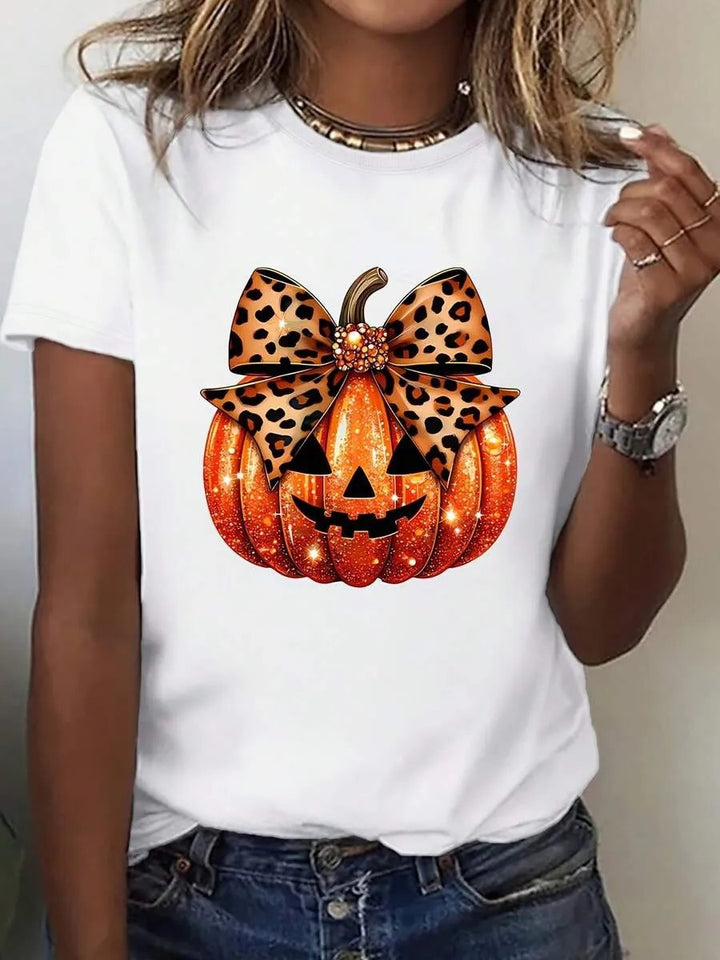 Dame T-shirt med stiligt pumpamotiv och spännande djurtryck Mirla-Eva Jonsson