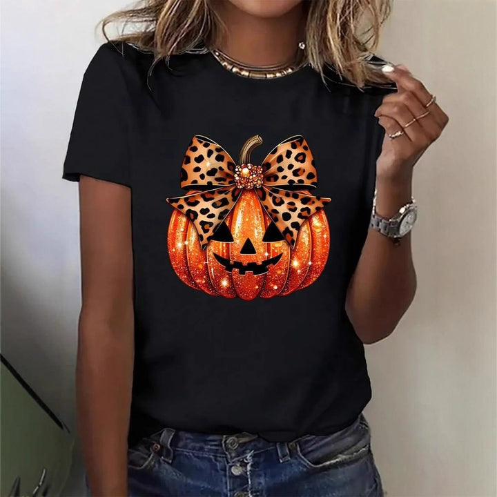 Dame T-shirt med stiligt pumpamotiv och spännande djurtryck Mirla-Eva Jonsson