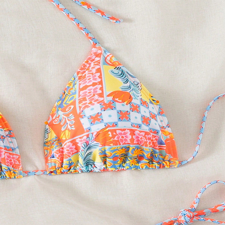 Dame Triangel-Bikini med lekfullt blommönster och eleganta knytband Mirla-Eva Jonsson