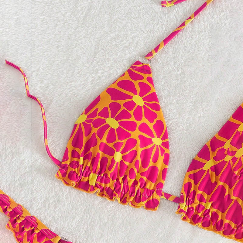 Dame Triangel-Bikini med lekfullt blommönster och volangdetaljer Mirla-Eva Jonsson