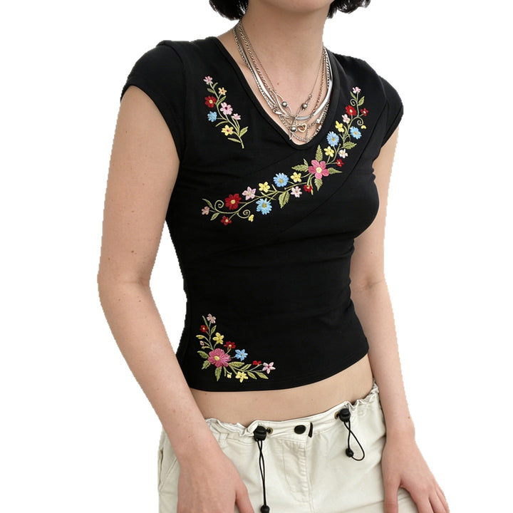Dame V-hals T-shirt med blomsterbroderi och figurnära snitt Mirla-Eva Jonsson