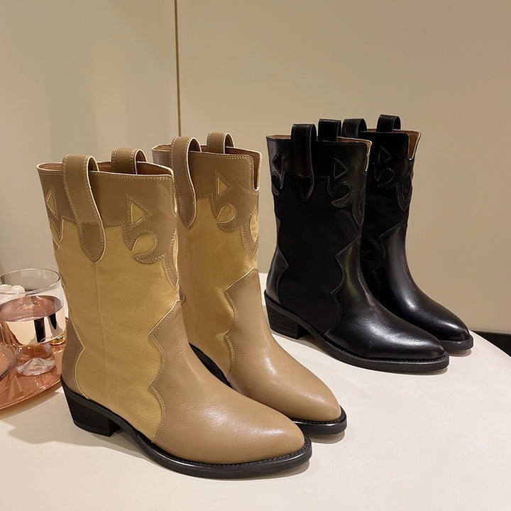 Dame Western stövlar med trendiga cut-out detaljer och robust blockklack Mirla-Eva Jonsson