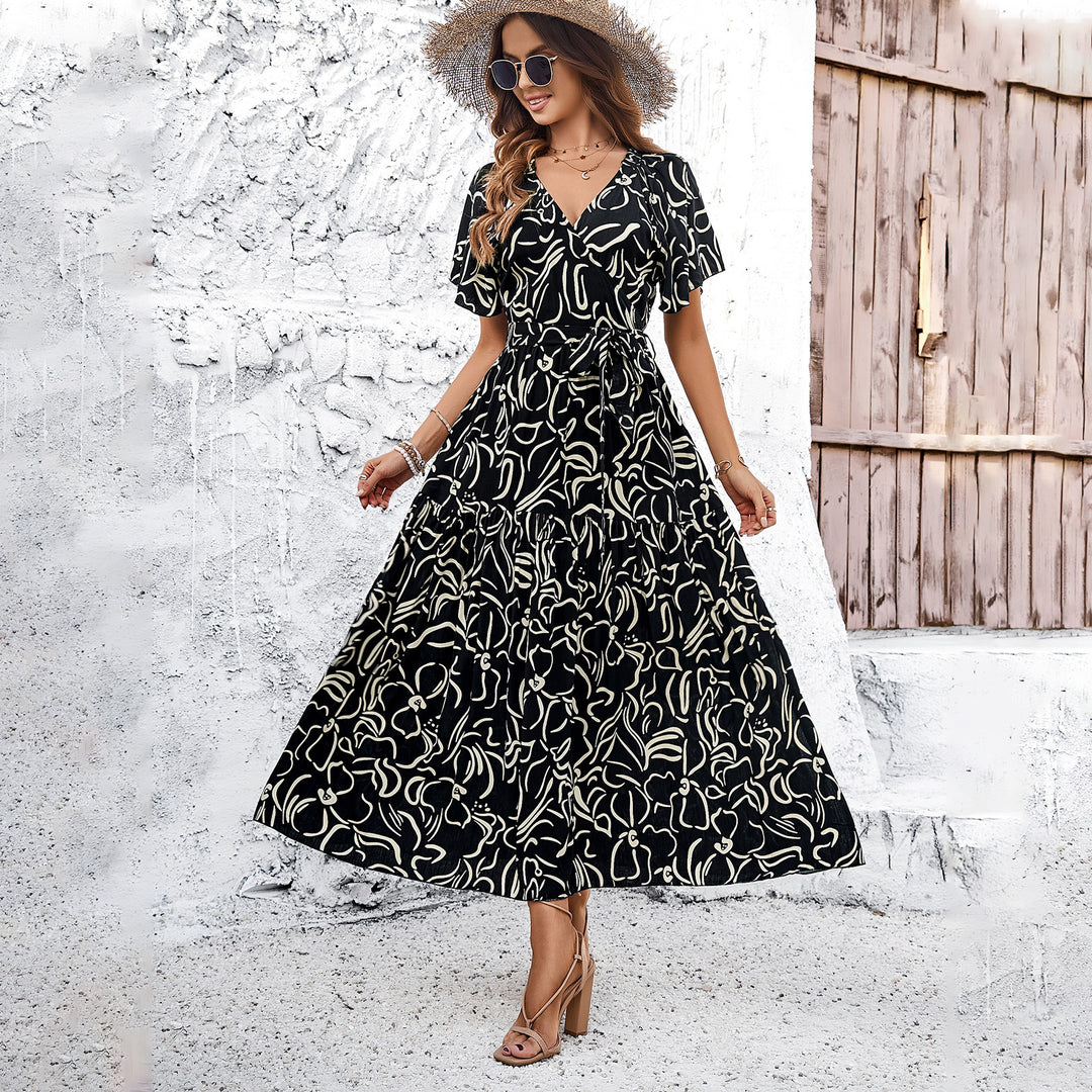 Dame Wickelmaxikleid mit luftigen Ärmeln und floralem Muster Mirla-Eva Jonsson