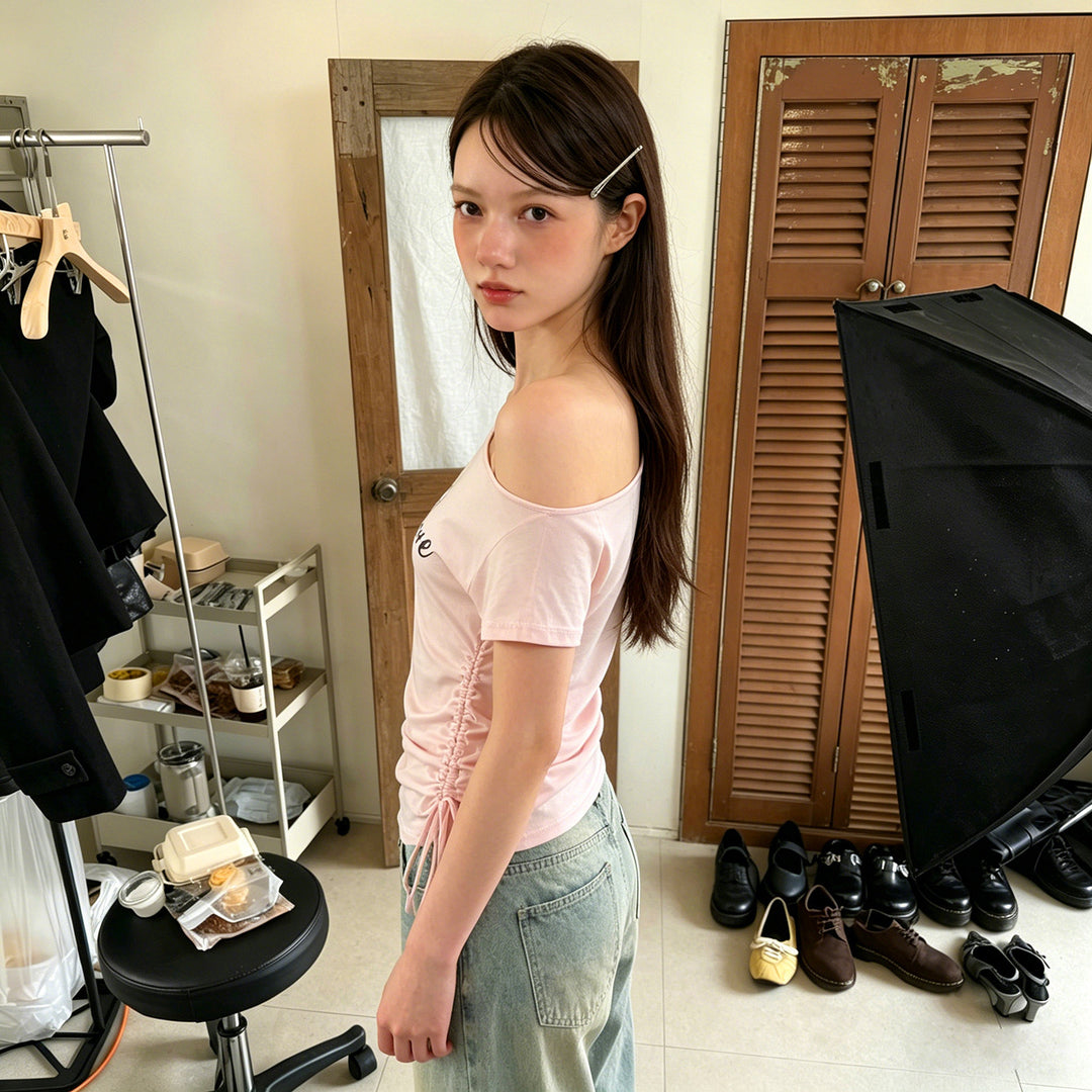 Dame asymmetrisk casual shirt med finessrika volangdetaljer Mirla-Eva Jonsson