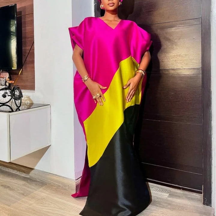 Dame asymmetrisk kaftan-klänning med voluminösa ärmar Mirla-Eva Jonsson