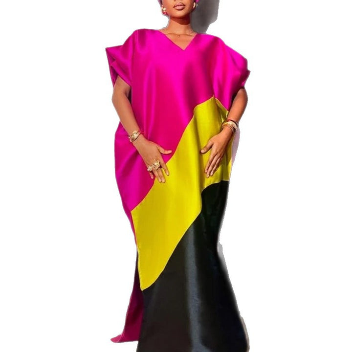 Dame asymmetrisk kaftan-klänning med voluminösa ärmar Mirla-Eva Jonsson