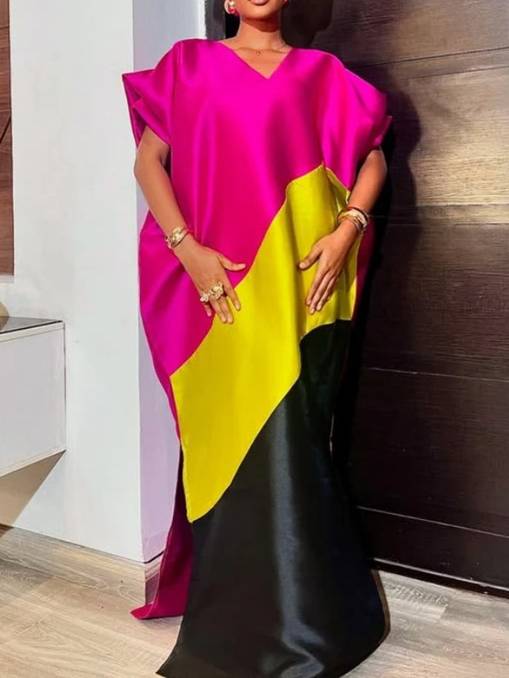 Dame asymmetrisk kaftan-klänning med voluminösa ärmar Mirla-Eva Jonsson
