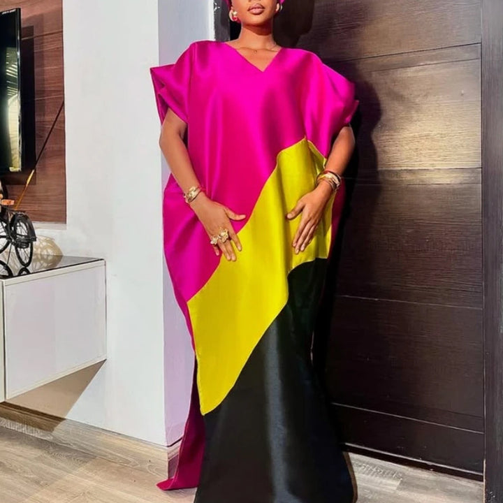 Dame asymmetrisk kaftan-klänning med voluminösa ärmar Mirla-Eva Jonsson