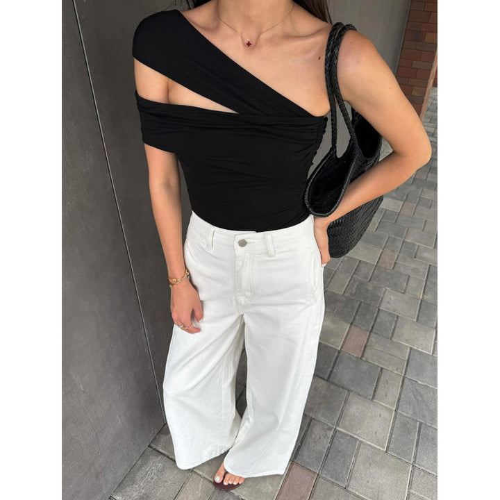 Dame asymmetrisk topp med elegant omslagdetalj Mirla-Eva Jonsson